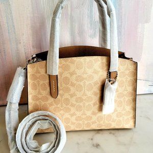 Coach Charlie Carryall 28 in Signature Canvas